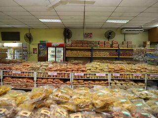 Azhar Food Supplier shop floor packed with kerepek, Sinar Harian 12 Dec 2020.